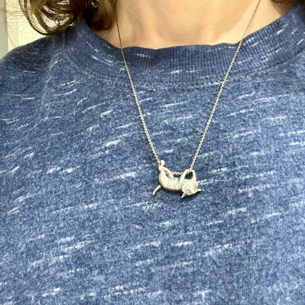 Sterling silver cat pendant and chain.